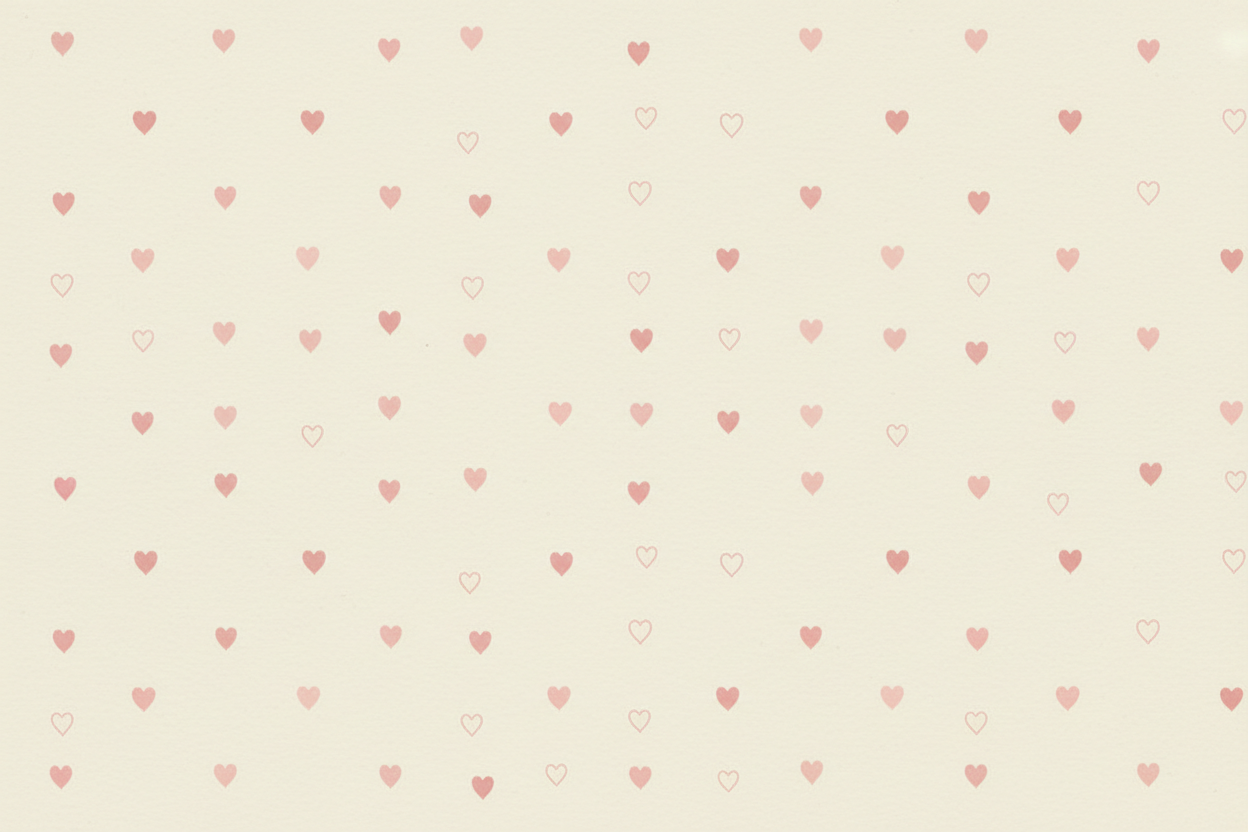 cream background with tiny pink hearts scattered